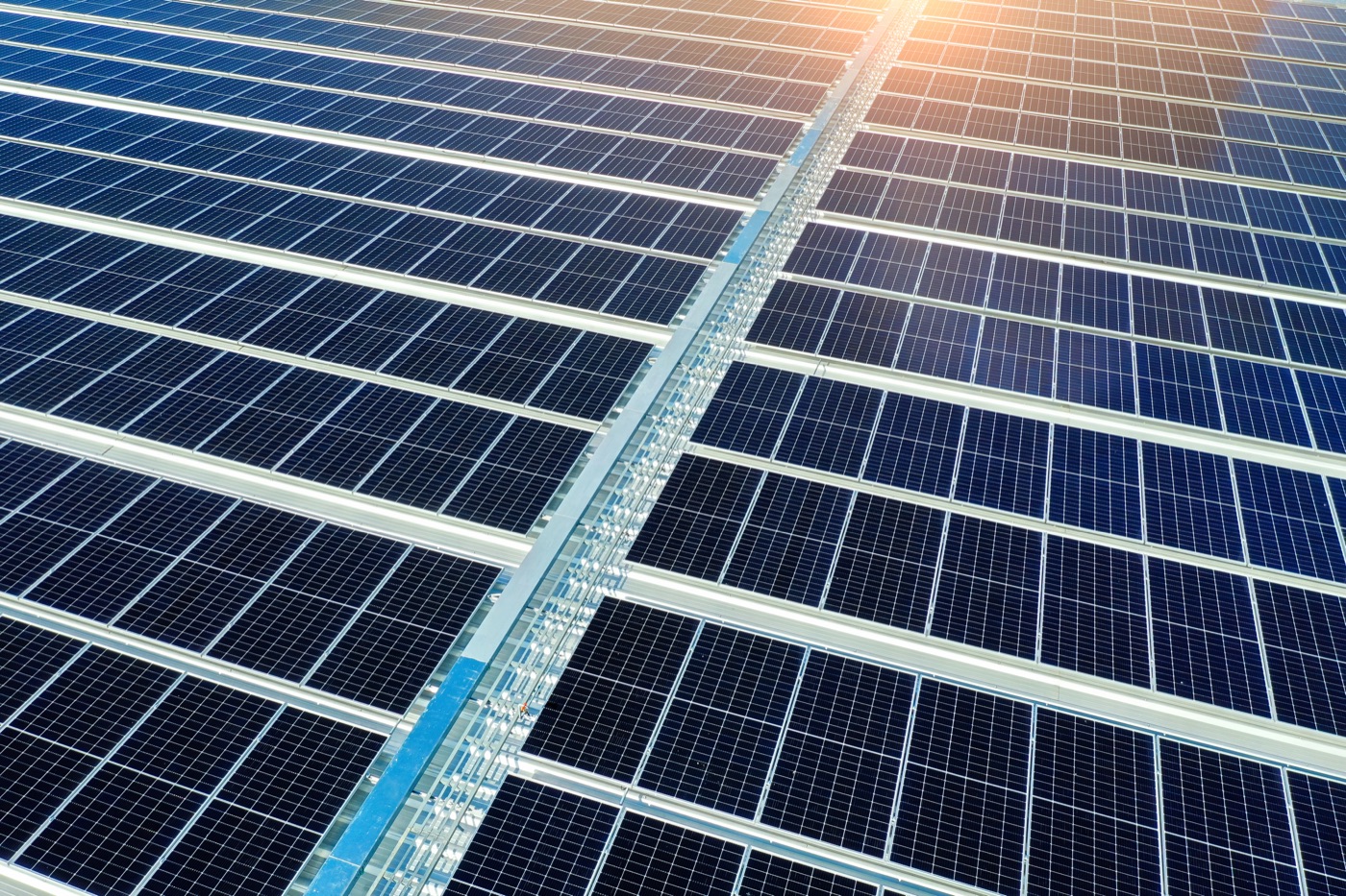 Rows of blue solar modules catching the sunlight